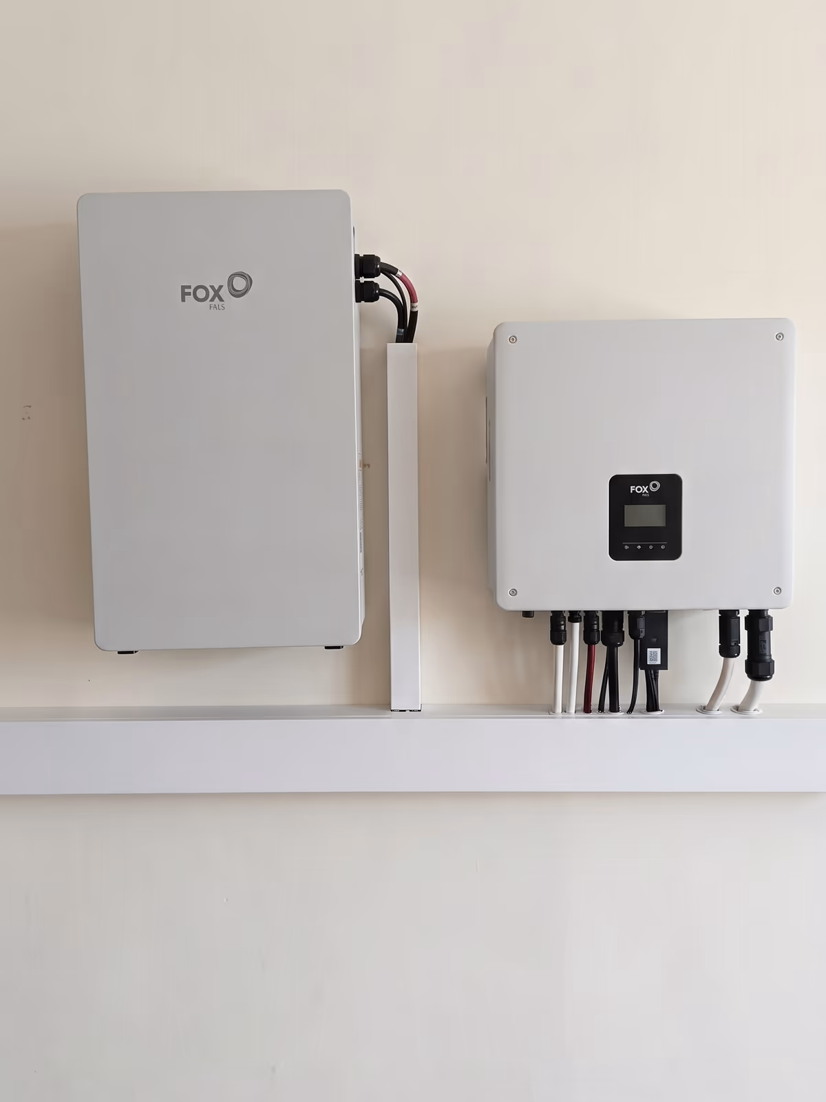 FOX ESS EP6 battery and hybrid inverter mounted side by side above the trunking